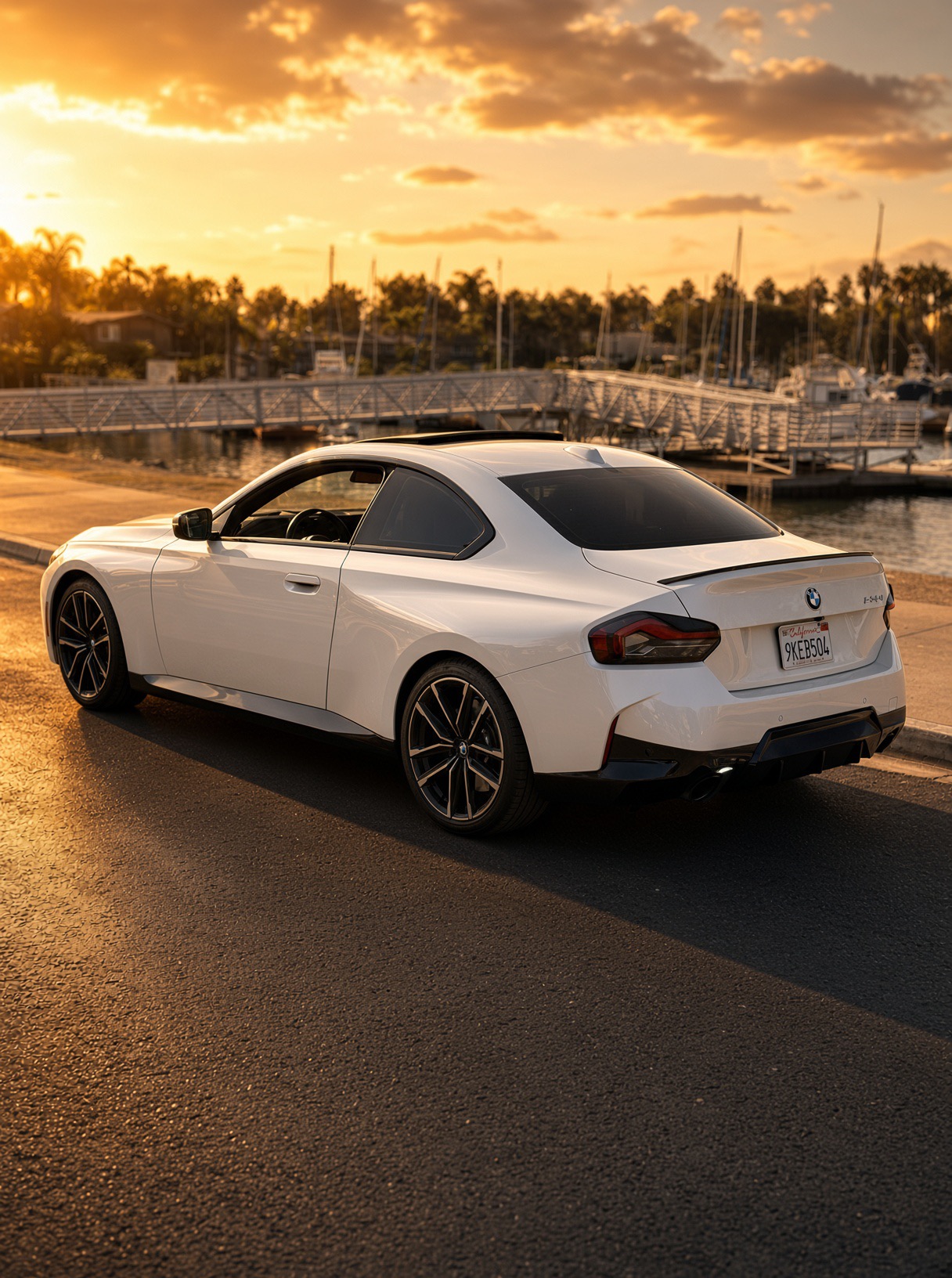 2024 BMW 230i M Package — Rear three-quarter view